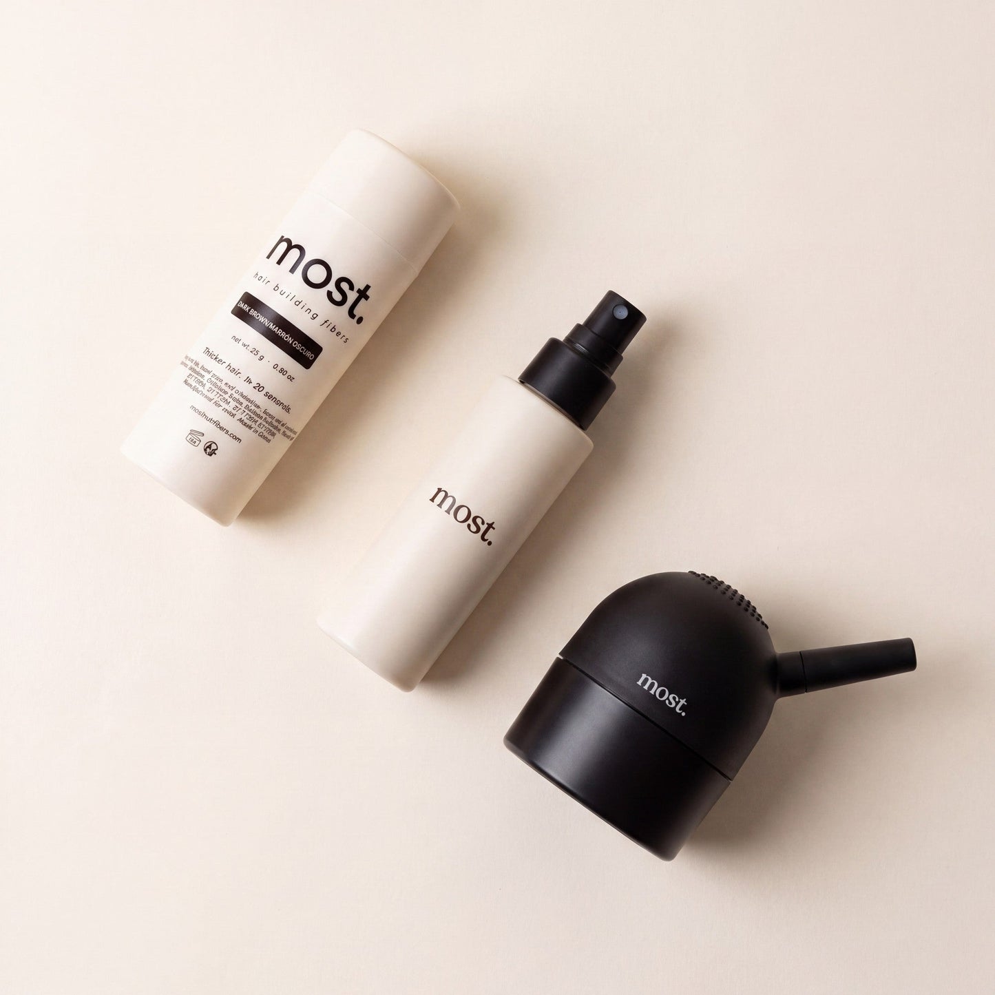 most. hair fibers, AnchorSet spray and precision applicator laid flat