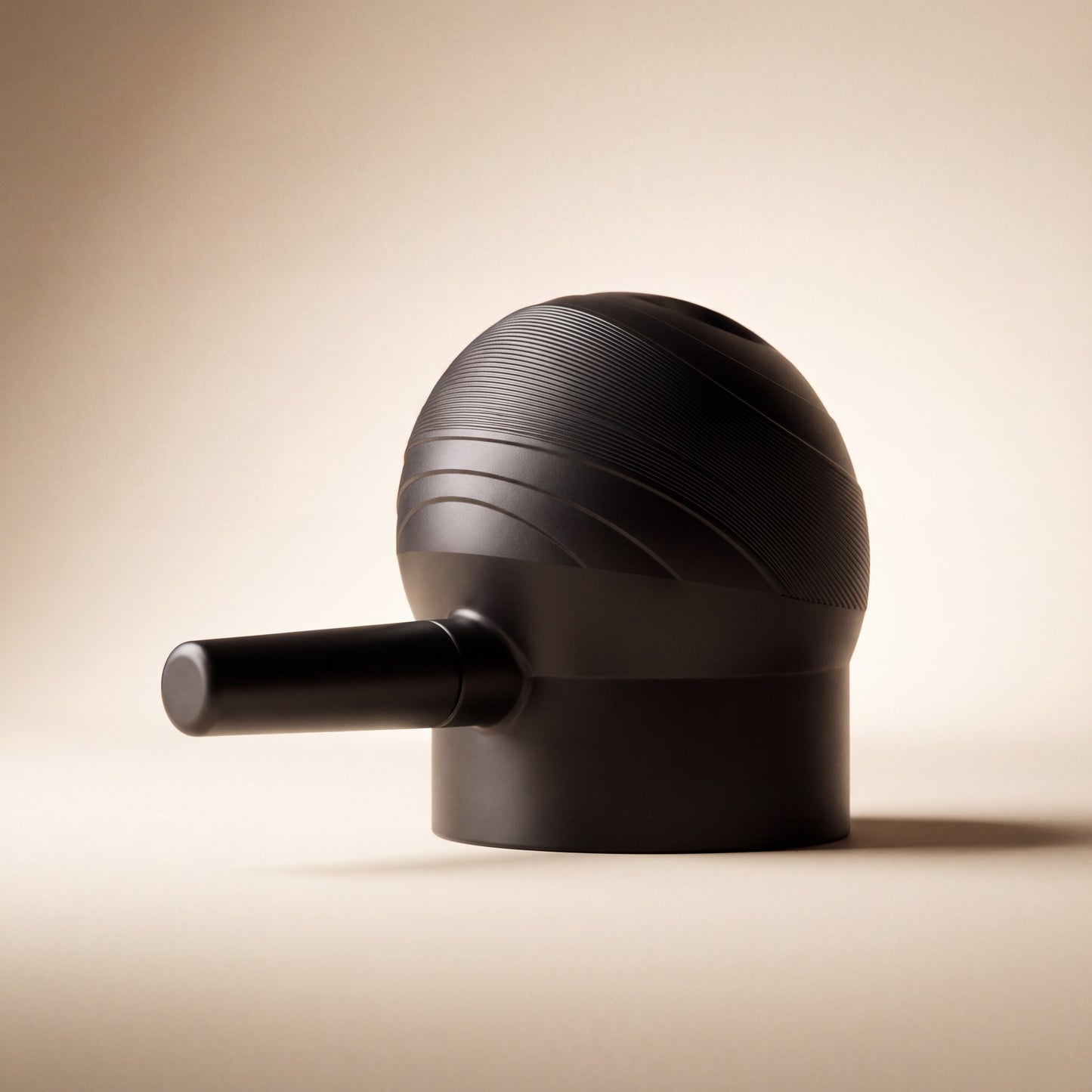 The most. Precision Applicator, a matte black ribbed pump bulb with a fine nozzle
