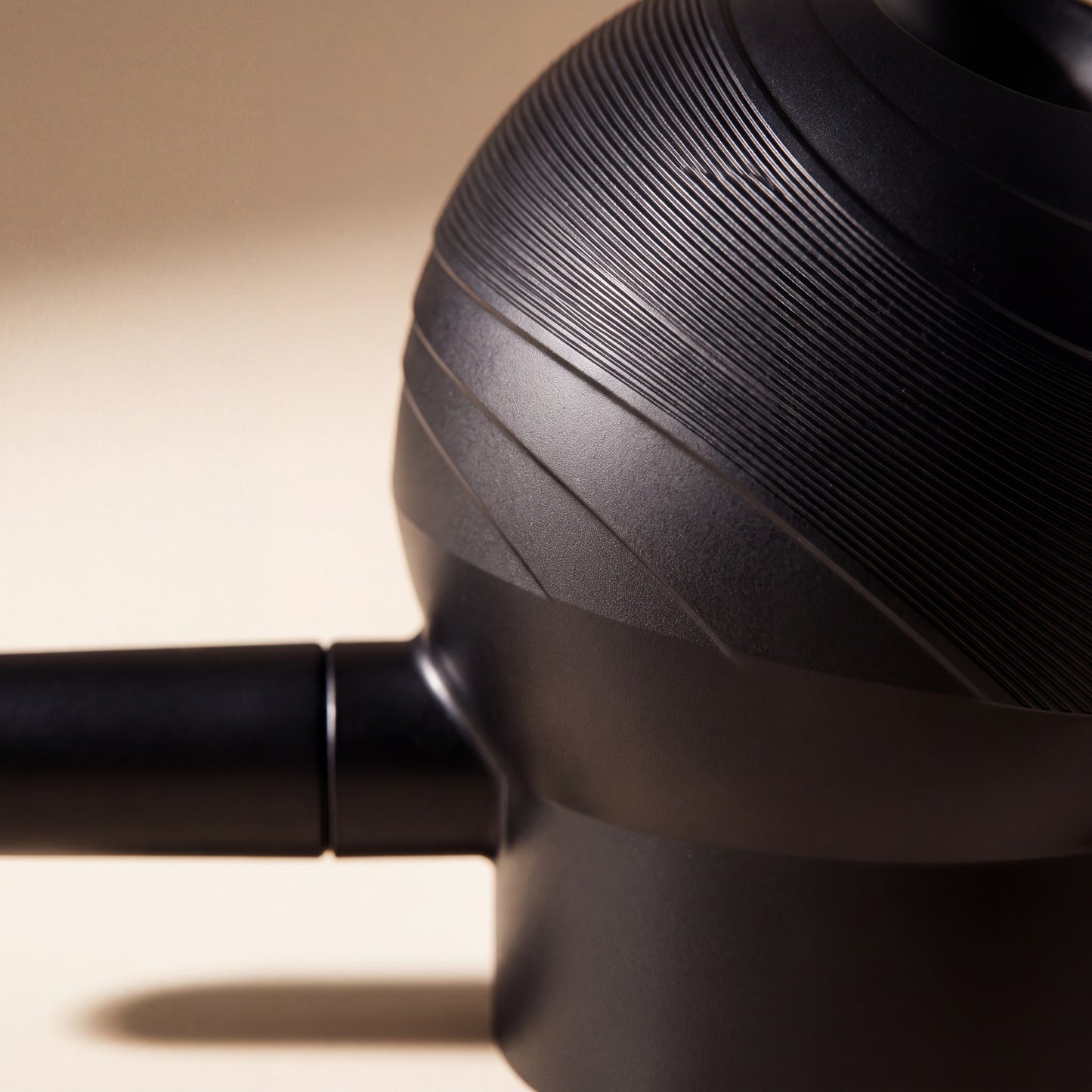 Close detail of the ribbed grip and nozzle join on the most. Precision Applicator
